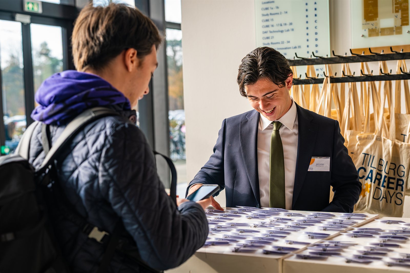 A visitor being welcomed at Tilburg Career Days